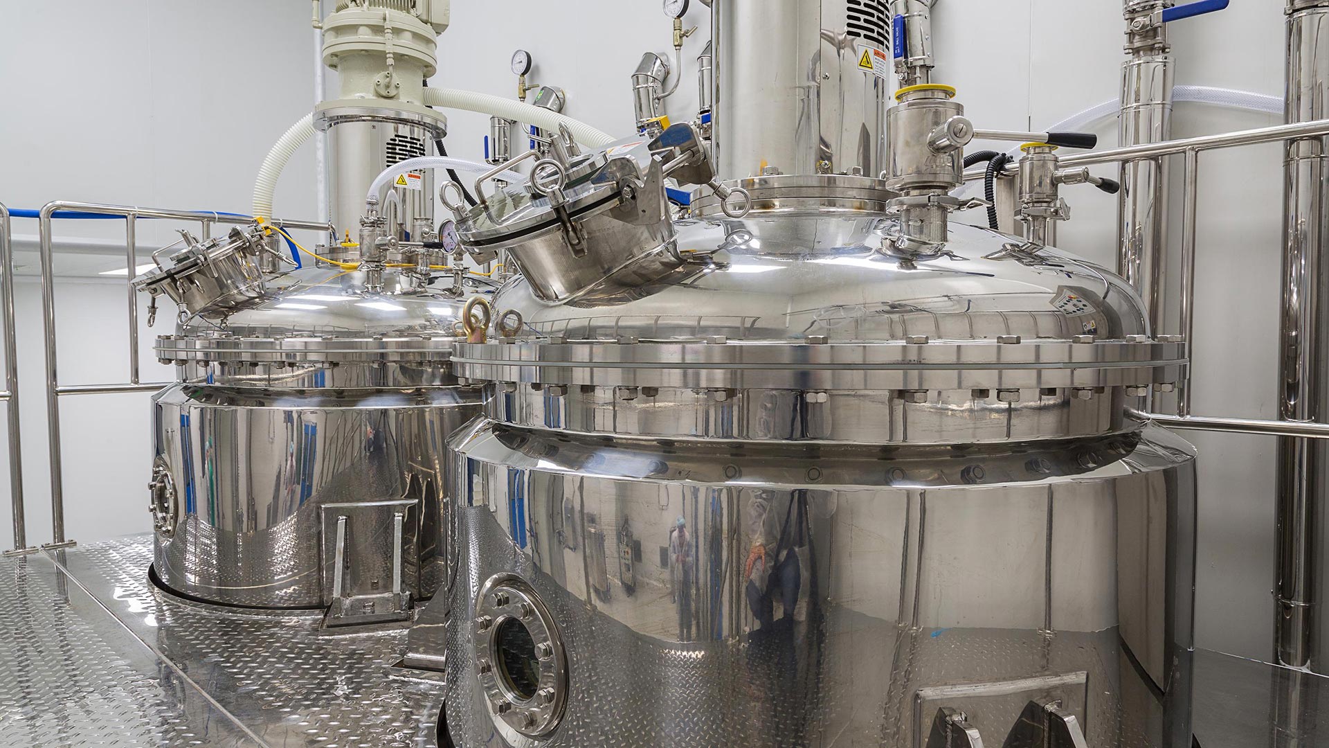 Stainless-steel filter vessel inside a chemical processing plant